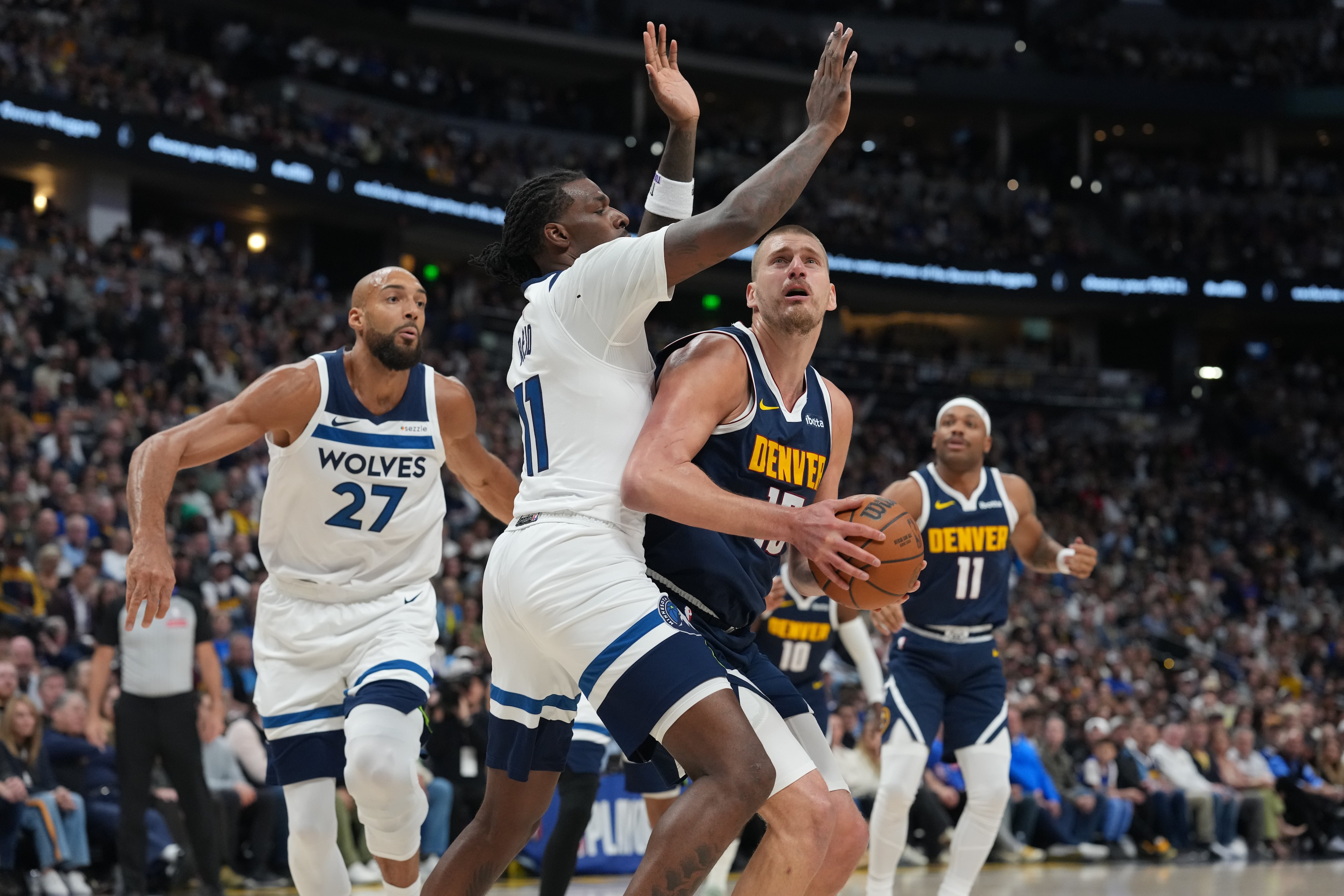 Nuggets Stave Off Elimination: Jokic's Triple-Double Seals 125-113 Win Against Timberwolves